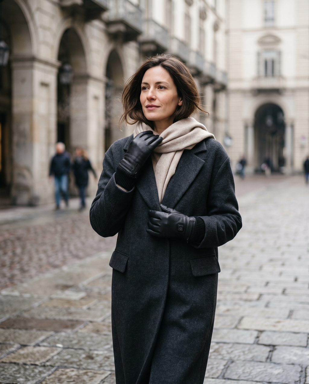 Black heated gloves worn on a cold winter street (placeholder image)